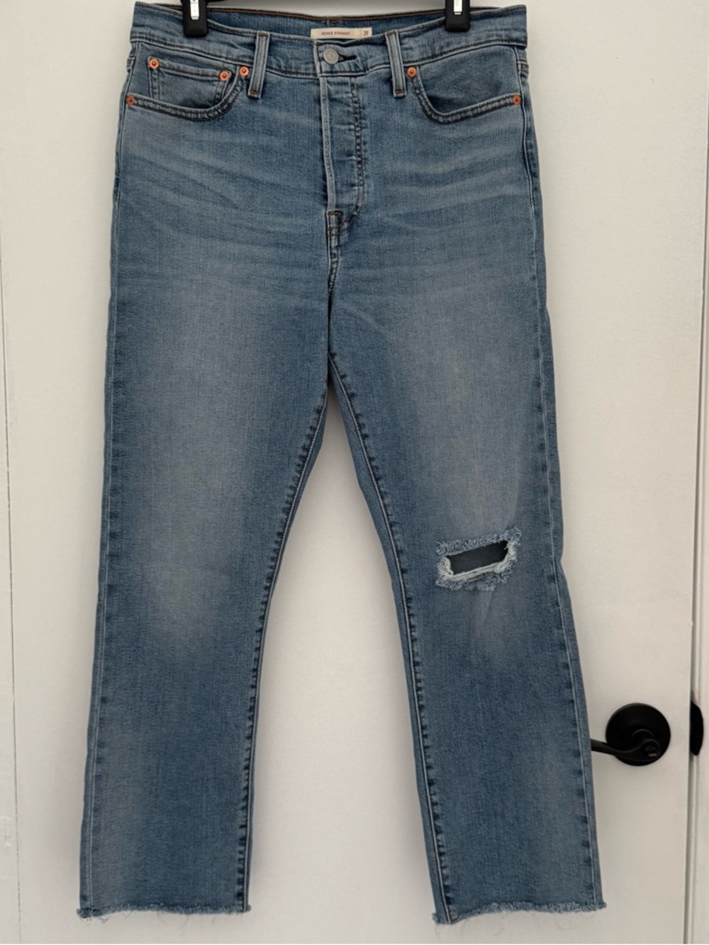 Levi's Medium Wash Straight Leg Jeans with Knee Distress